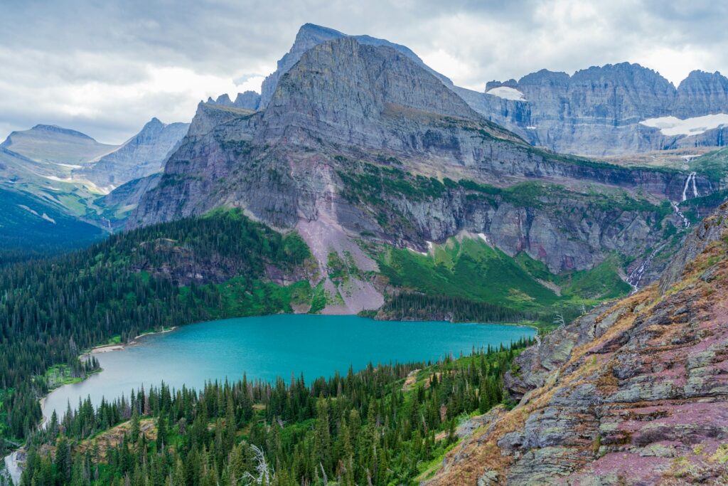 Cost to visit Glacier: scenic lake surrounded by mountains in Glacier National Park, Montana