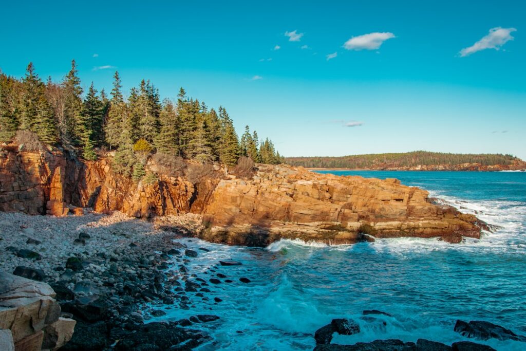 Cost to visit Acadia National Park: rocky granite coastline meeting the sea in Maine