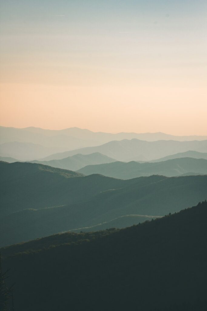 Cost to visit the Smokies: misty blue layered ridges of Great Smoky Mountains National Park